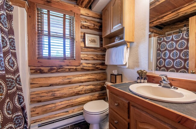 Building Photo - Charming Log Cabin and Carriage House – Do...