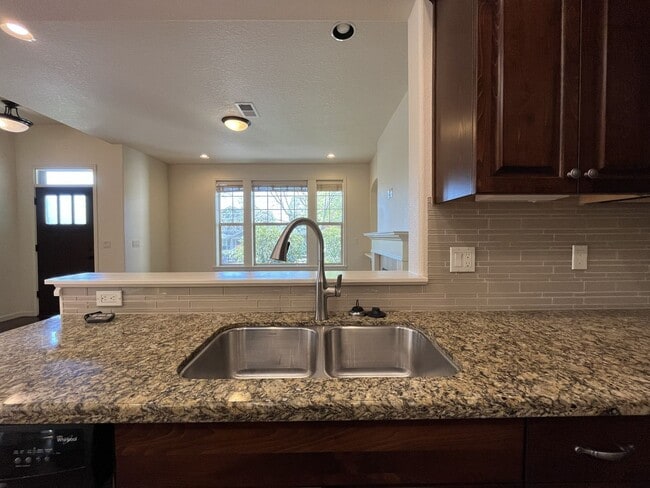 Building Photo - 3BD/3BA Bethany Home with Vaulted Ceilings, Stainless Appliances & Gas Fireplace