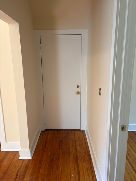 door to interior hallway - 19 Essex Ave