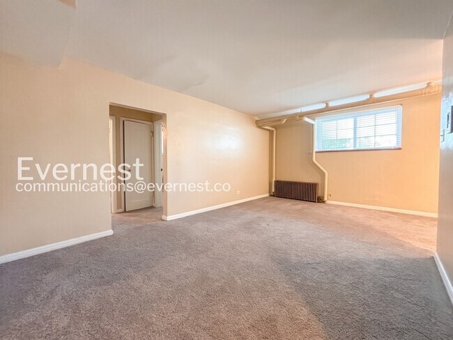 Building Photo - 1 Bed, 1 Bath Condo with Modern Amenities / Available Soon!