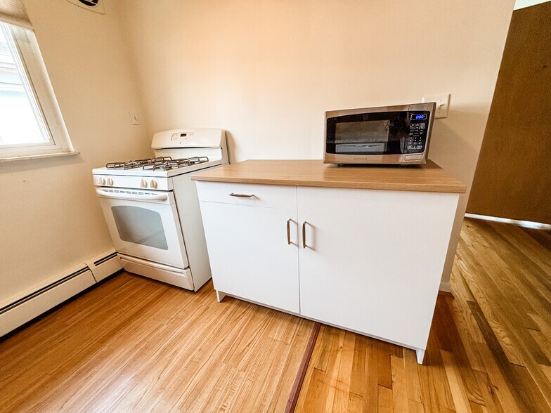Extra counter top space and microwave provided - 3150 Schubert Ave