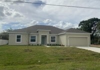Building Photo - 1142 SW Edinburgh Dr