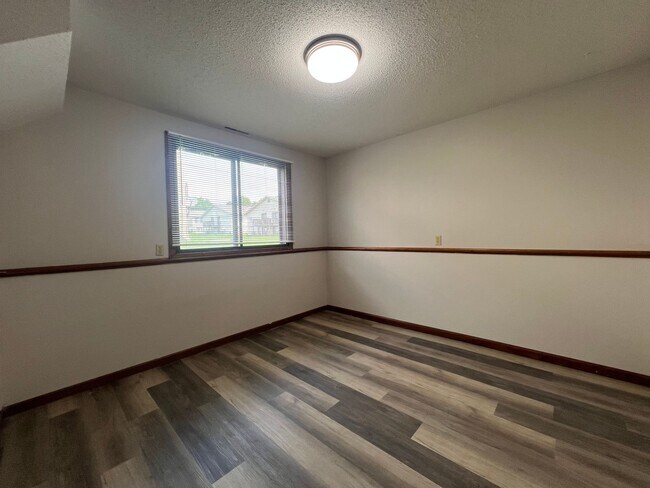 Building Photo - Spacious 2-Bed, 1-Bath Townhome with a Gar...