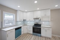 4BR, 2BA - 1,358SF - Kitchen - Ivy Court Apartments