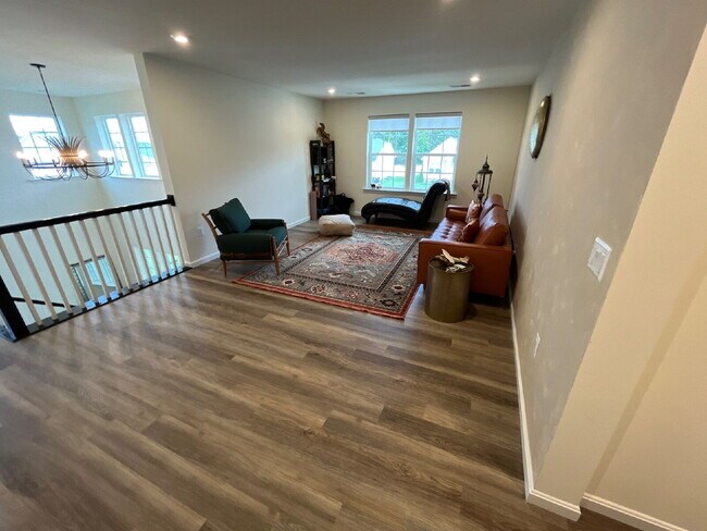 Building Photo - Stunning 5-Bedroom Custom Home with Solar, EV Charging & Private Media Room