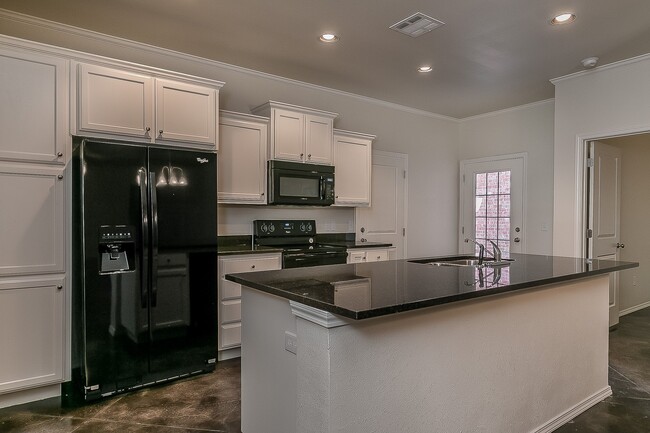 Building Photo - Stunning Hillside Terrace Townhome