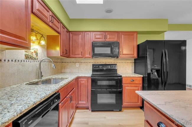 Building Photo - 9400 Wehrle Dr