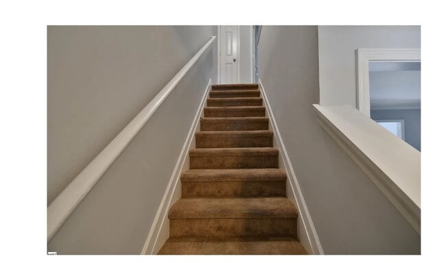Building Photo - Charming 2-bedroom, 2.5-bathroom townhouse...