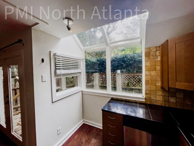 Building Photo - Pet Friendly End Unit!