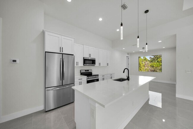 Building Photo - Single family for rent in Port Charlotte. New construction. 3+Den/ 2 bath. City water.