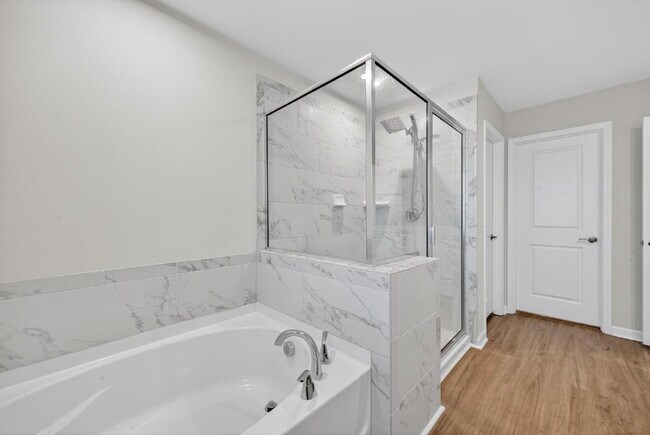 Building Photo - Like-New Harlem Home!