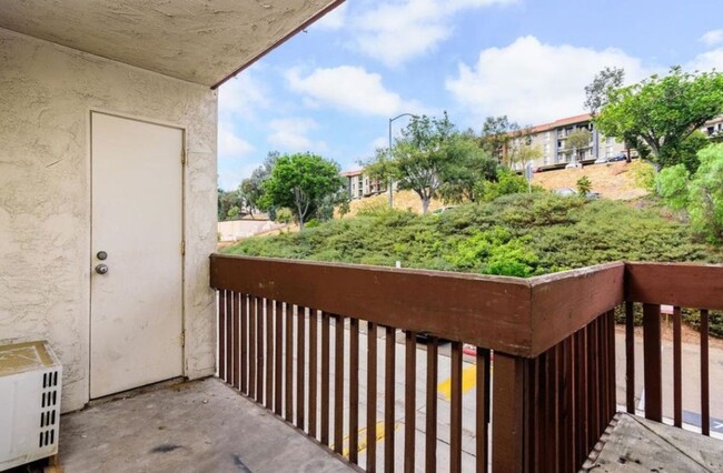 Building Photo - Spacious and Comfortable Condo -  A/C - Ce...