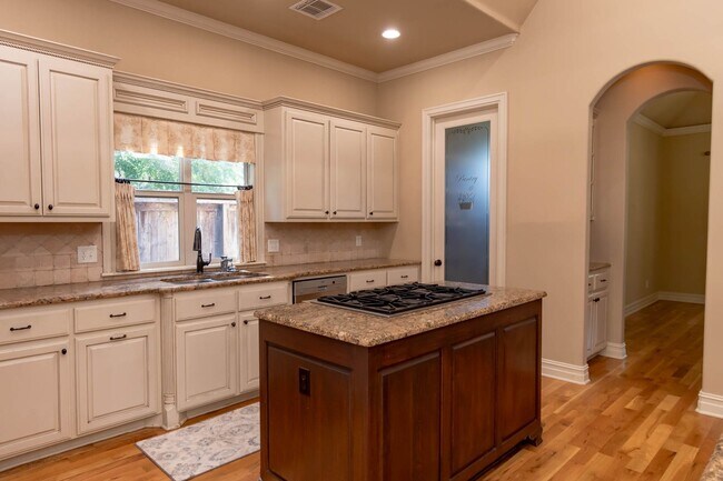Building Photo - Rare lease opportunity in the exclusive ga...