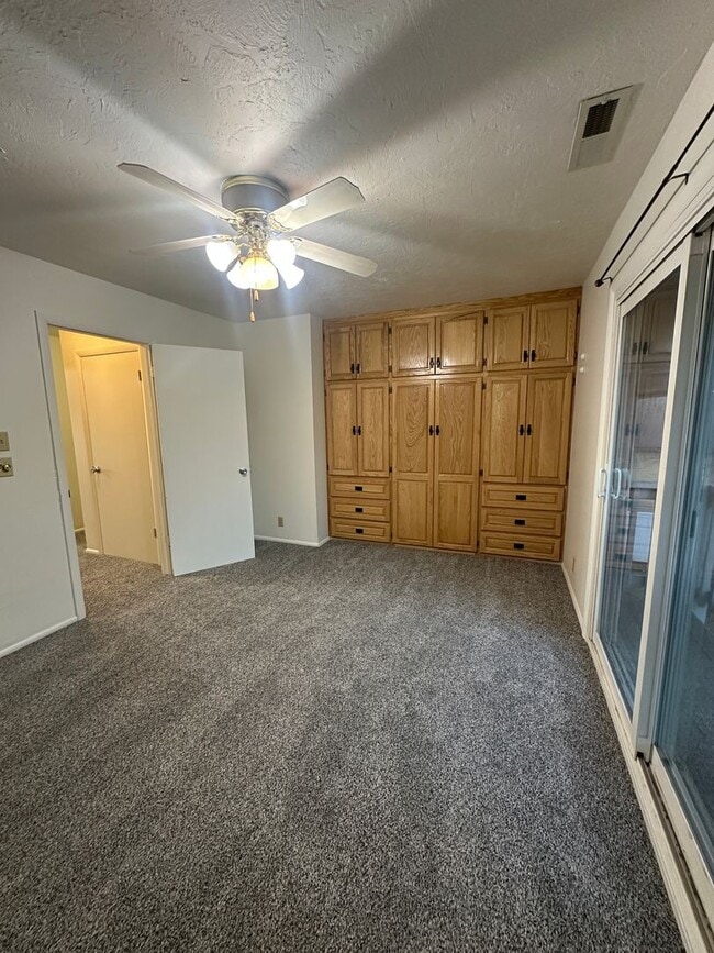 Building Photo - Spacious, three level, 4 Bed 2.5 bath Townhome in Ammon right behind the Walmart on Hitt.