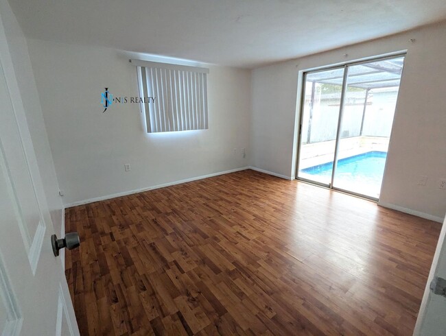 Building Photo - JUST REDUCED!!!   SCREENED IN POOL, WINE F...