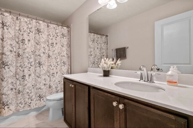 Building Photo - Water Front Home- 4 Large Bedrooms-3 baths Gated Community Call Sheila Campbell 407-687-7900