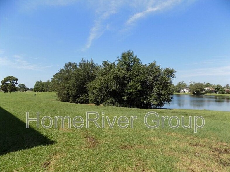 Building Photo - 13929 Fairway Island Dr