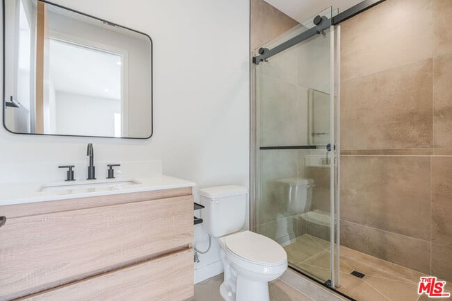 Building Photo - 8670 Encino Ave