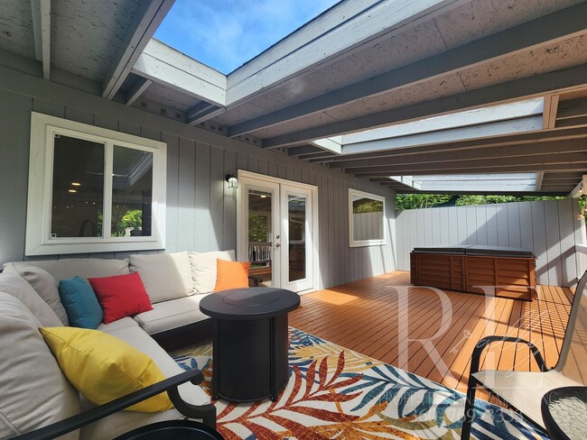 Building Photo - Rambler with Fantastic Covered Deck & Community Pool