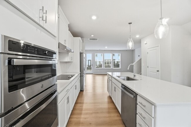 Building Photo - Brand-new three-story townhome in the University area at Senata at Research Park!