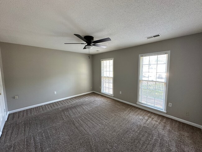 Building Photo - Charming 3BR/2BA Near Southwind | Hardwood Floors, Brick Fireplace, Bay Window & 2-Car Garage