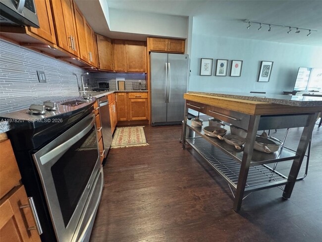 Building Photo - 19380 Collins Ave