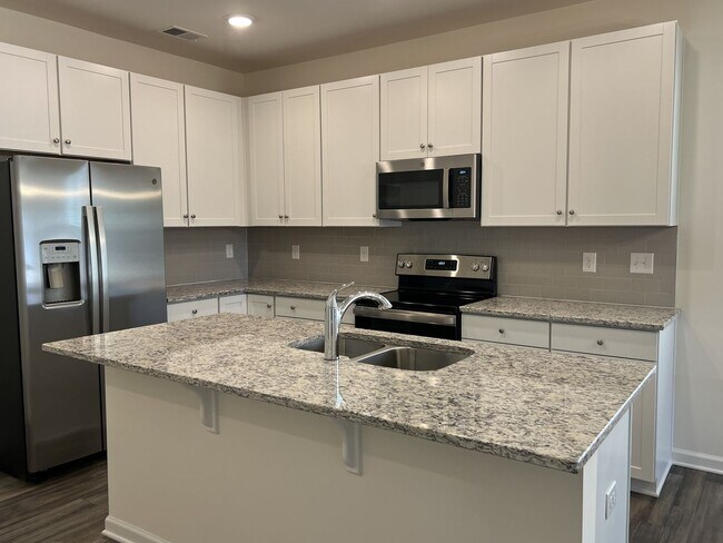 Building Photo - $1,000 Off First Full Month Rent