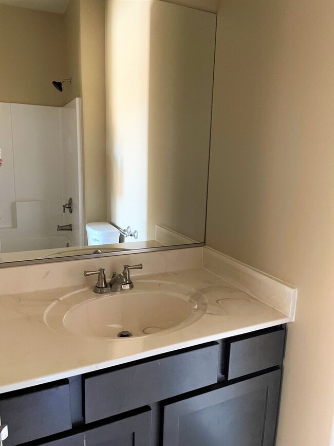 Building Photo - APPLICATION PENDING- Three Bedroom Home in...