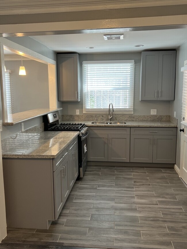 Remodeled Kitchen with Range - 3332-3336 Stocker St