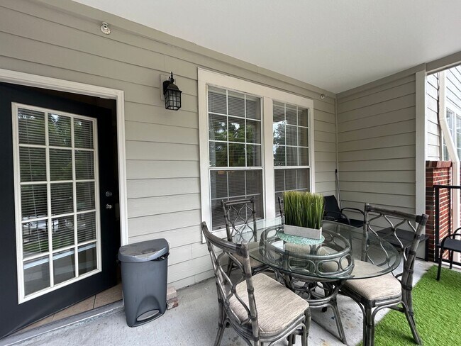 Building Photo - Walk to UF! Spacious & Furnished 3BD Condo...