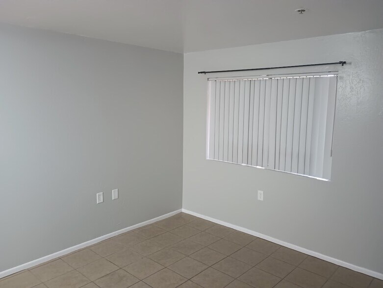 Lining room area - all new paint - 12221 W Bell Rd