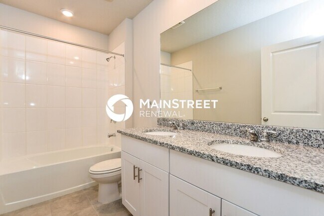 Building Photo - 4 Bedroom Pet-Friendly Home in Auburndale, FL with Main Street Renewal