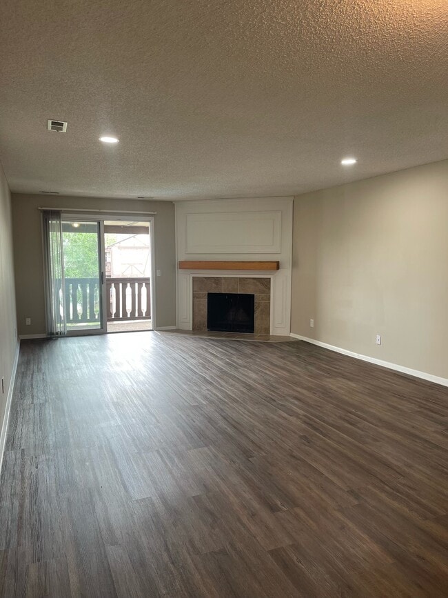 Upgraded 2 Bedroom Apartment equipped with a beautiful balcony view & Cozy Fireplace - Twin Lakes Apartments