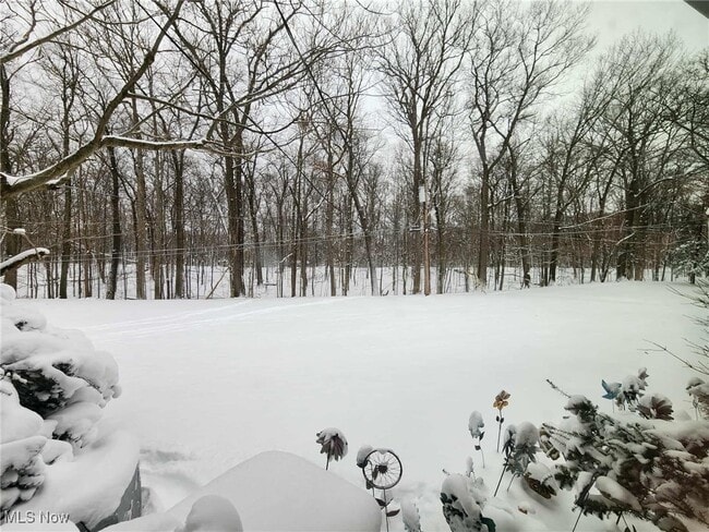 Building Photo - 6960 Carriage Hill Dr