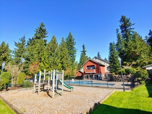 Building Photo - Lovely Condo in the Woods - Deck - Carport - FP - Closets - WD/DW - Fitness Center - Pools