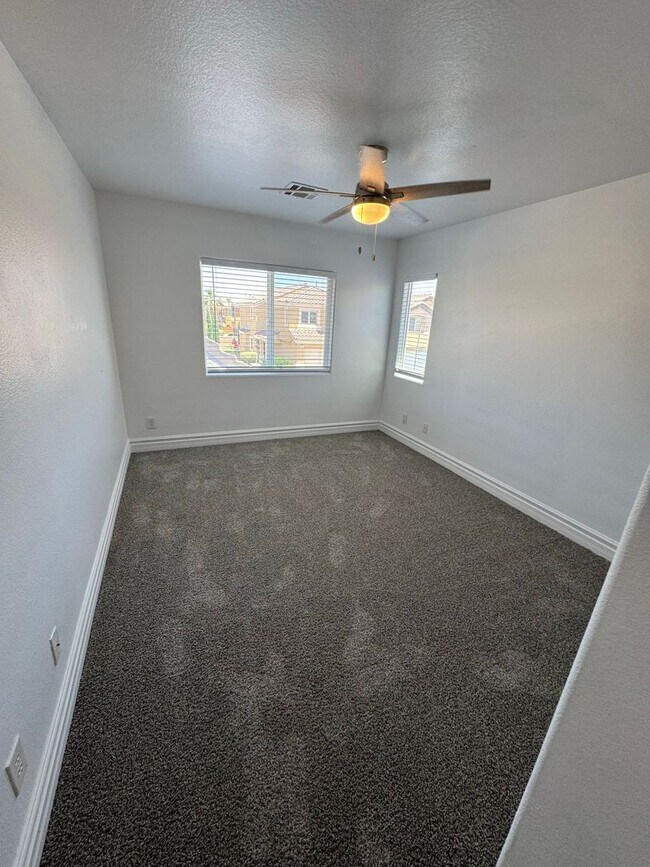 Building Photo - STUNNING 2 STORY HOME IN A GUARD GATED COM...