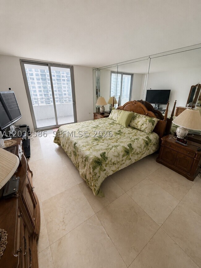 Building Photo - 5555 Collins Ave