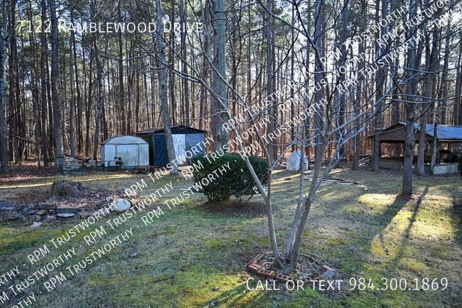 Building Photo - 7122 Ramblewood Dr