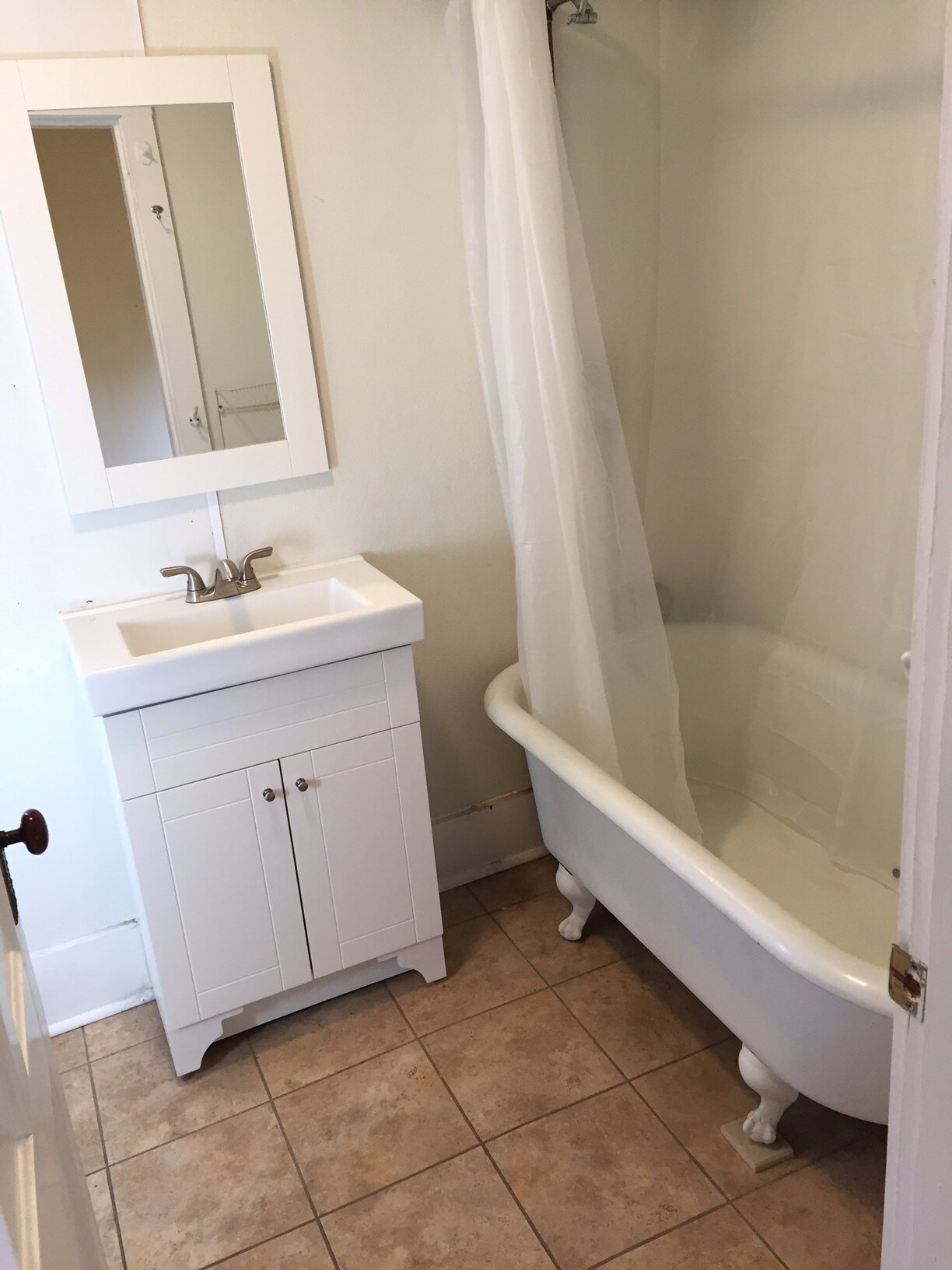 Antique claw foot tub - 282 Brackett Street