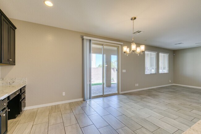 Building Photo - Beautiful Next-Gen Home with Private Entry Suite & Spacious Backyard