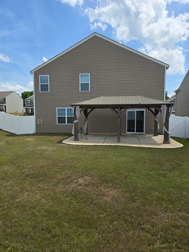 Building Photo - Corner Lot Rental Home with 4BR/2.5BA, Ful...