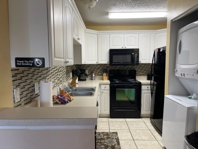 Building Photo - FULLY FURNISHED - Peaceful 4 Bed / 2 Bath Condo