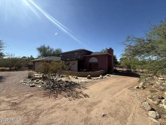 Building Photo - 5081 N Bear Canyon Rd