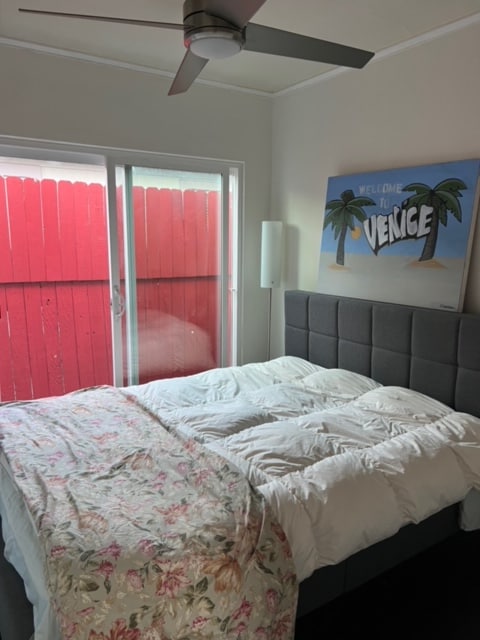 Bedroom facing sliding glass doors to side yard - 928 Marco Pl