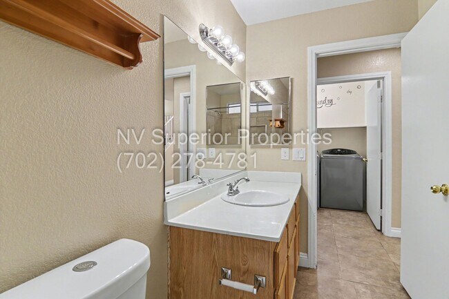 Building Photo - NW!! 4 bedrooms!! Bed & Bath DownStairs!!! RV Parking!!! Synthetic Grass Front yard!! Real Grass ...