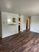 Building Photo - Large 1 & 2 bedroom apartments with balcony and garage