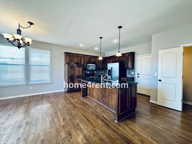 Building Photo - Gorgeous Olathe, 5 BR Home w/ Wood floors,...