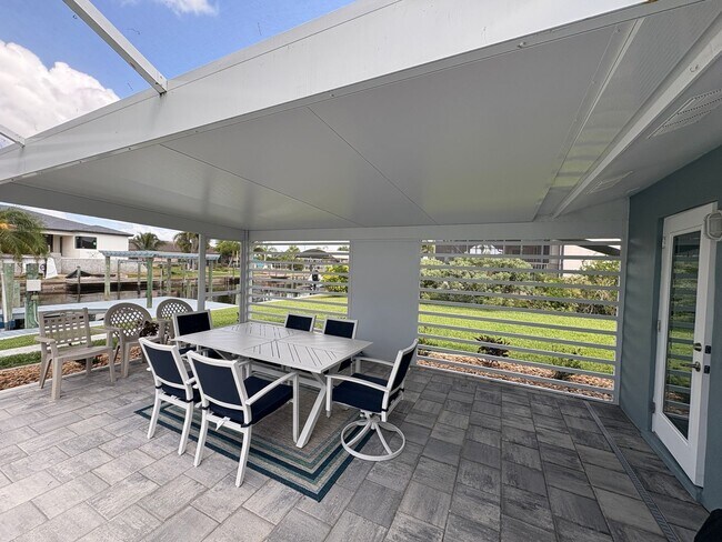Building Photo - Beautifully Furnished Pool Home with Boat ...