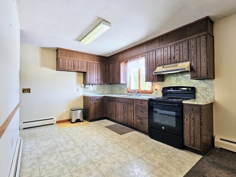 Building Photo - 8409 Lancaster Ave