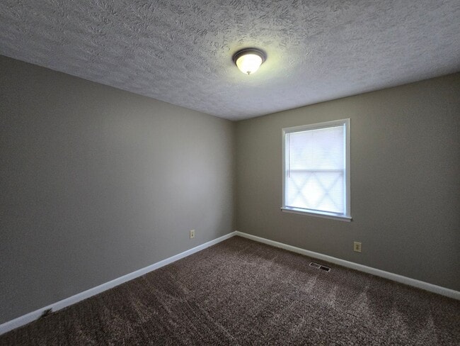 Building Photo - 6003 McDougal Dr